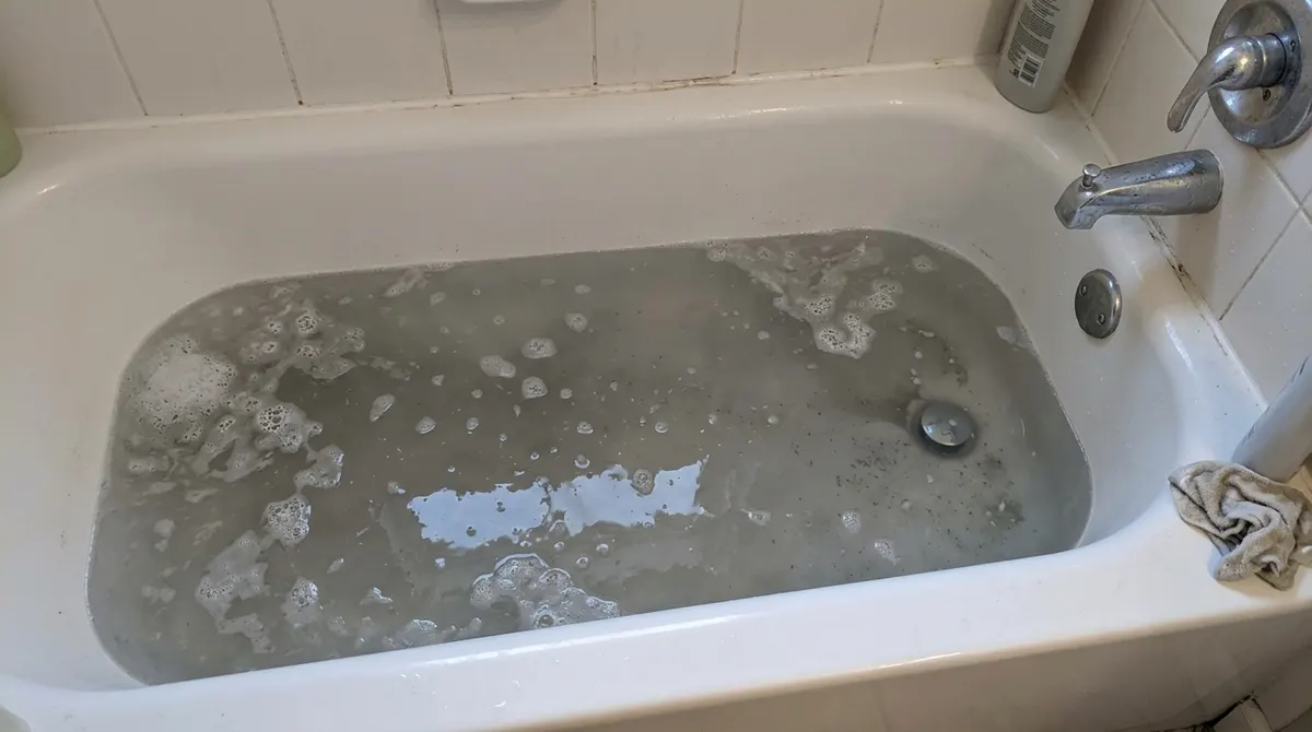 Bathtub with standing water that won't drain